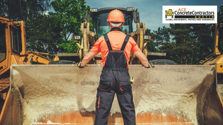 concrete contractor in front of bulldozer