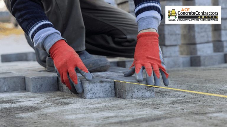 contractor installing brick paver