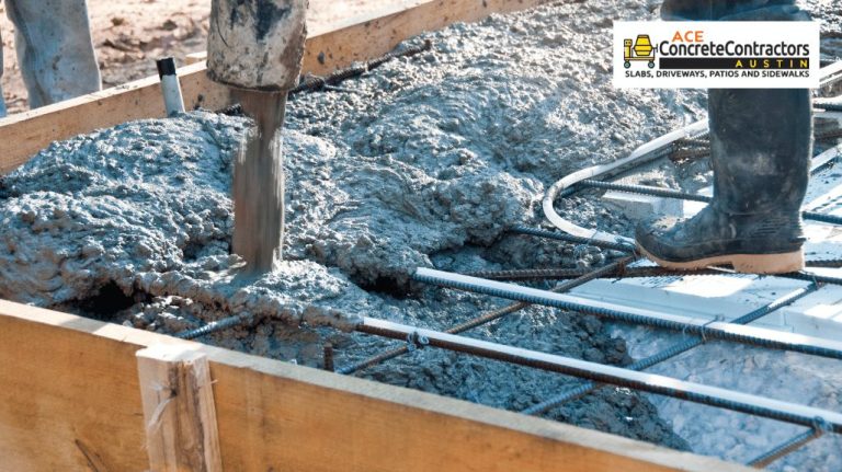 Contractor pouring a concrete mix to reinforced foundation