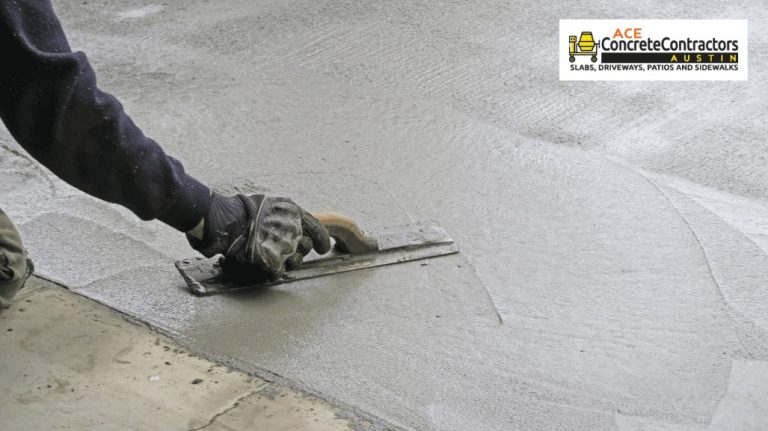 contractor flattening a wet concrete