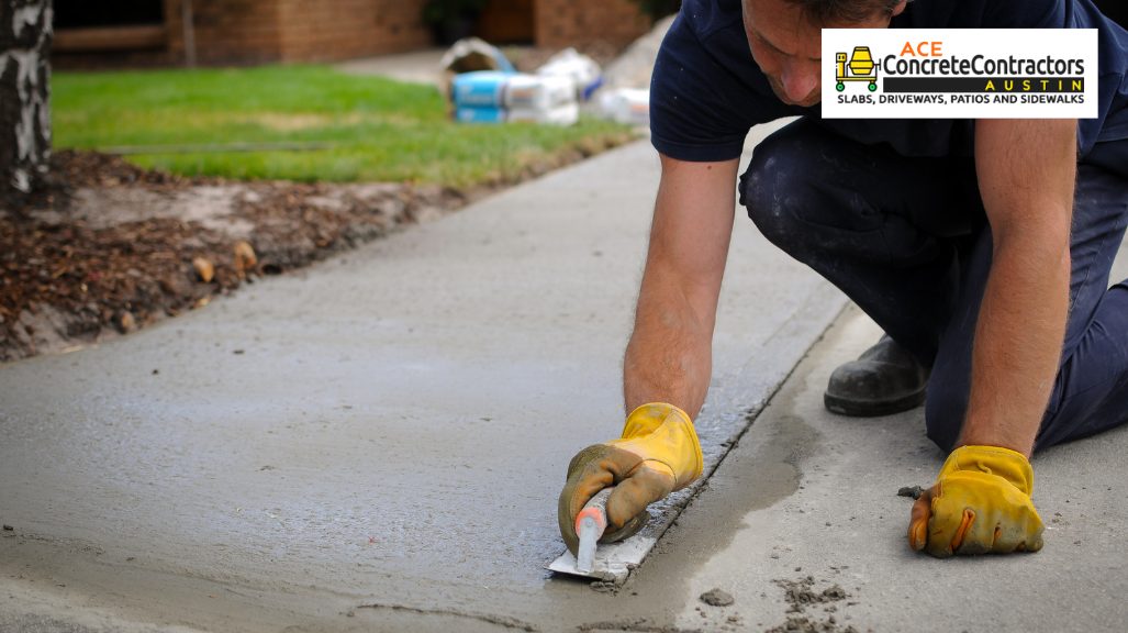 person leveling concrete surface