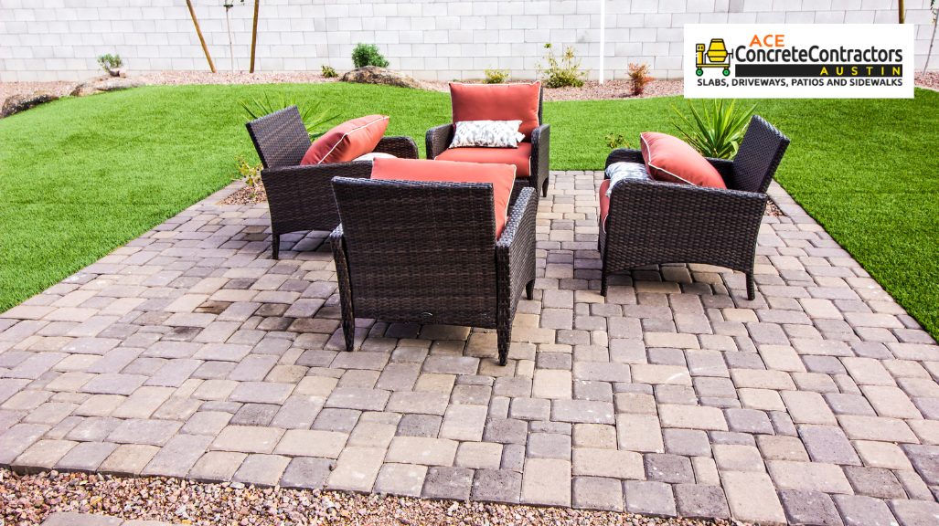 red padded woven sofa set on brick concrete patio