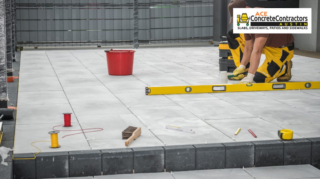 man checking the level of concrete blocks