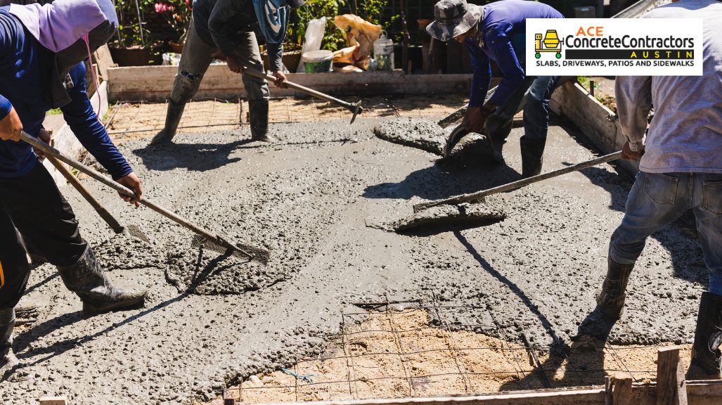 workers spreading concrete mix