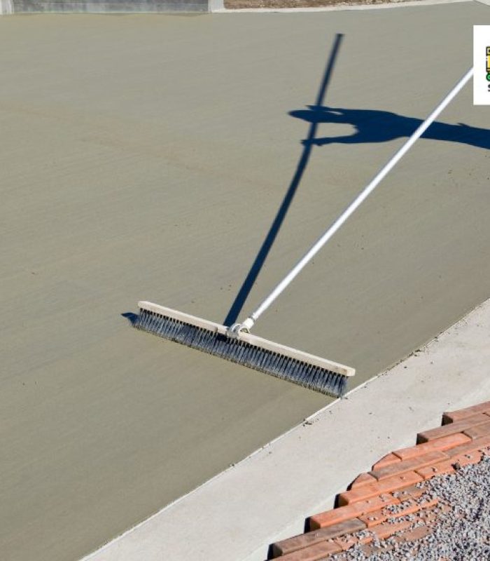 person leveling concrete