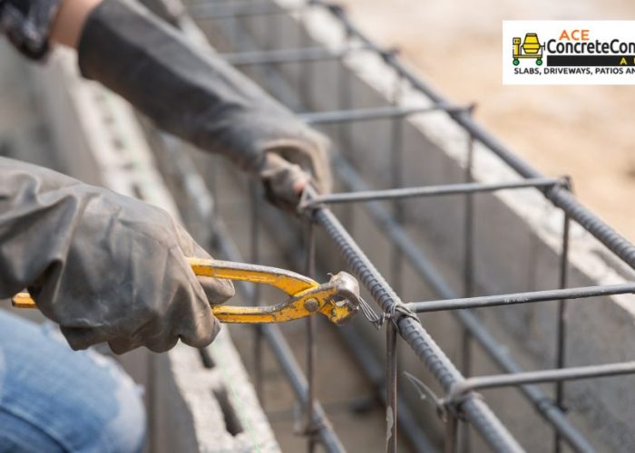 person cutting wire from steel