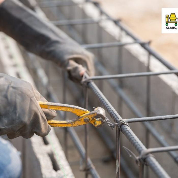 person cutting wire from steel