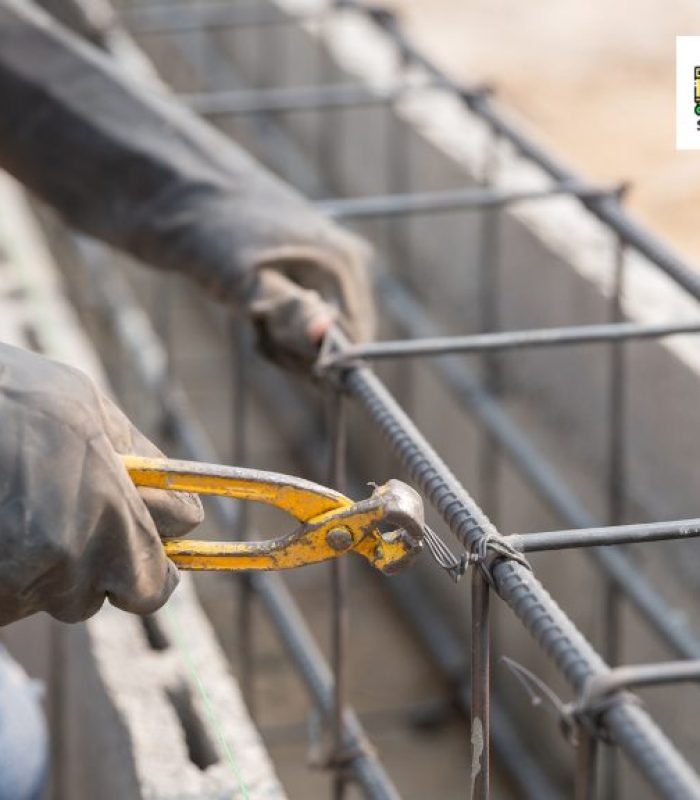 person cutting wire from steel