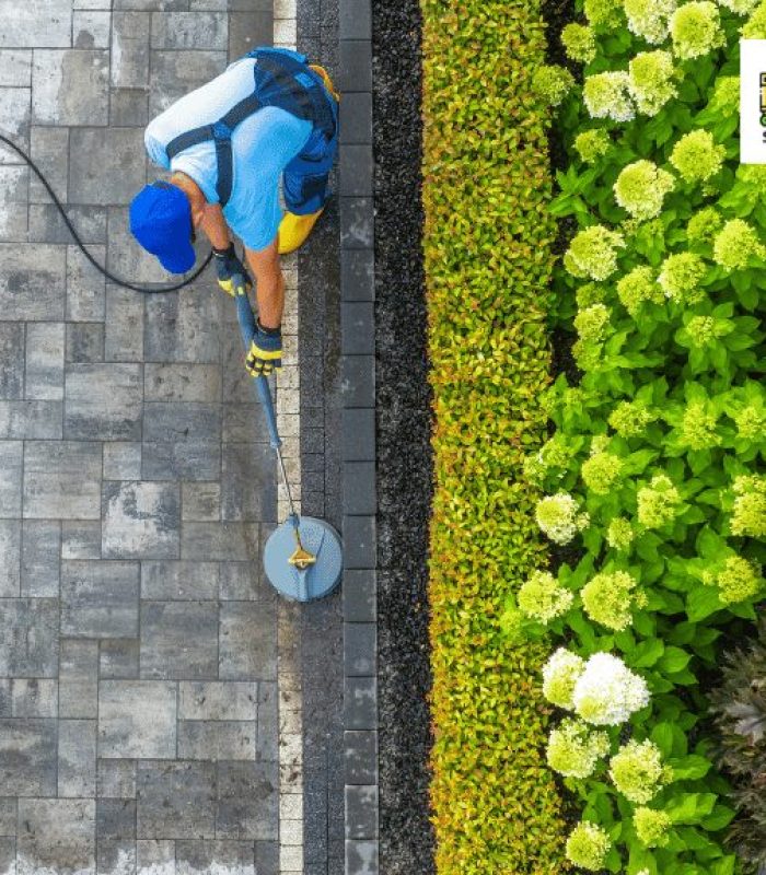 contractor cleaning the driveway